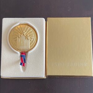 Estée Lauder Gold Compact Mirror with Ribbon Accent